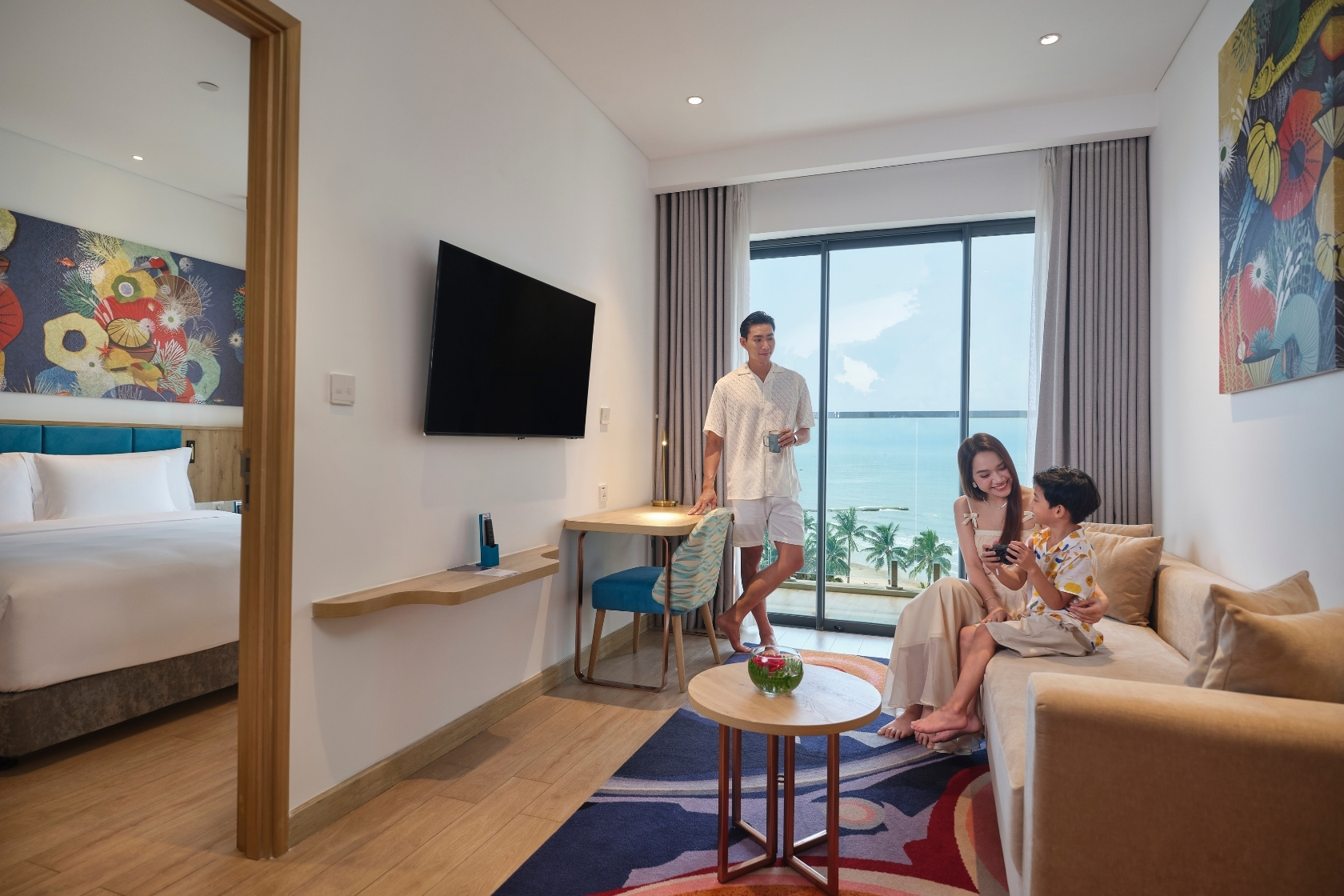 family stay in living room at dhawa classic sea view